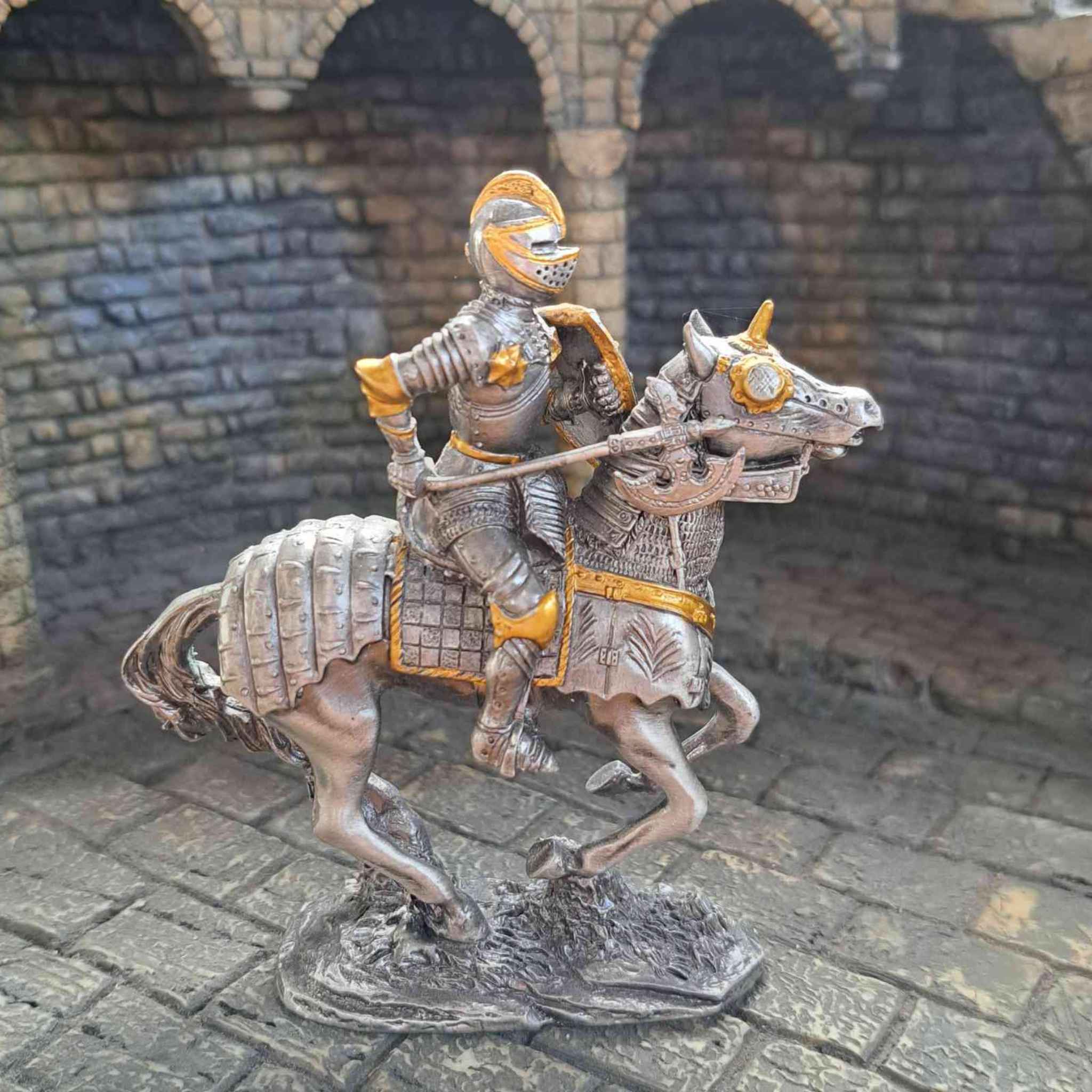 16th century mounted knight metal statue side view