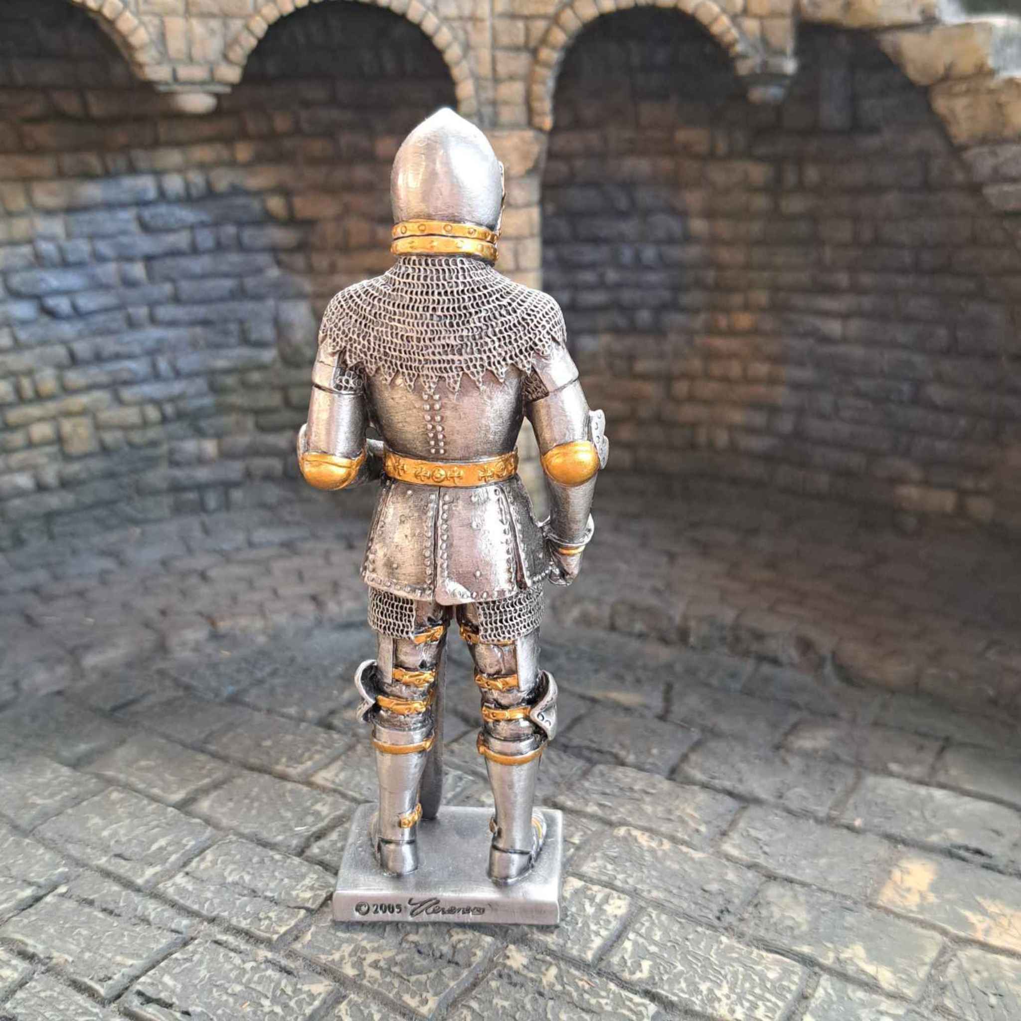 15th century bascinet metal knight statue back view