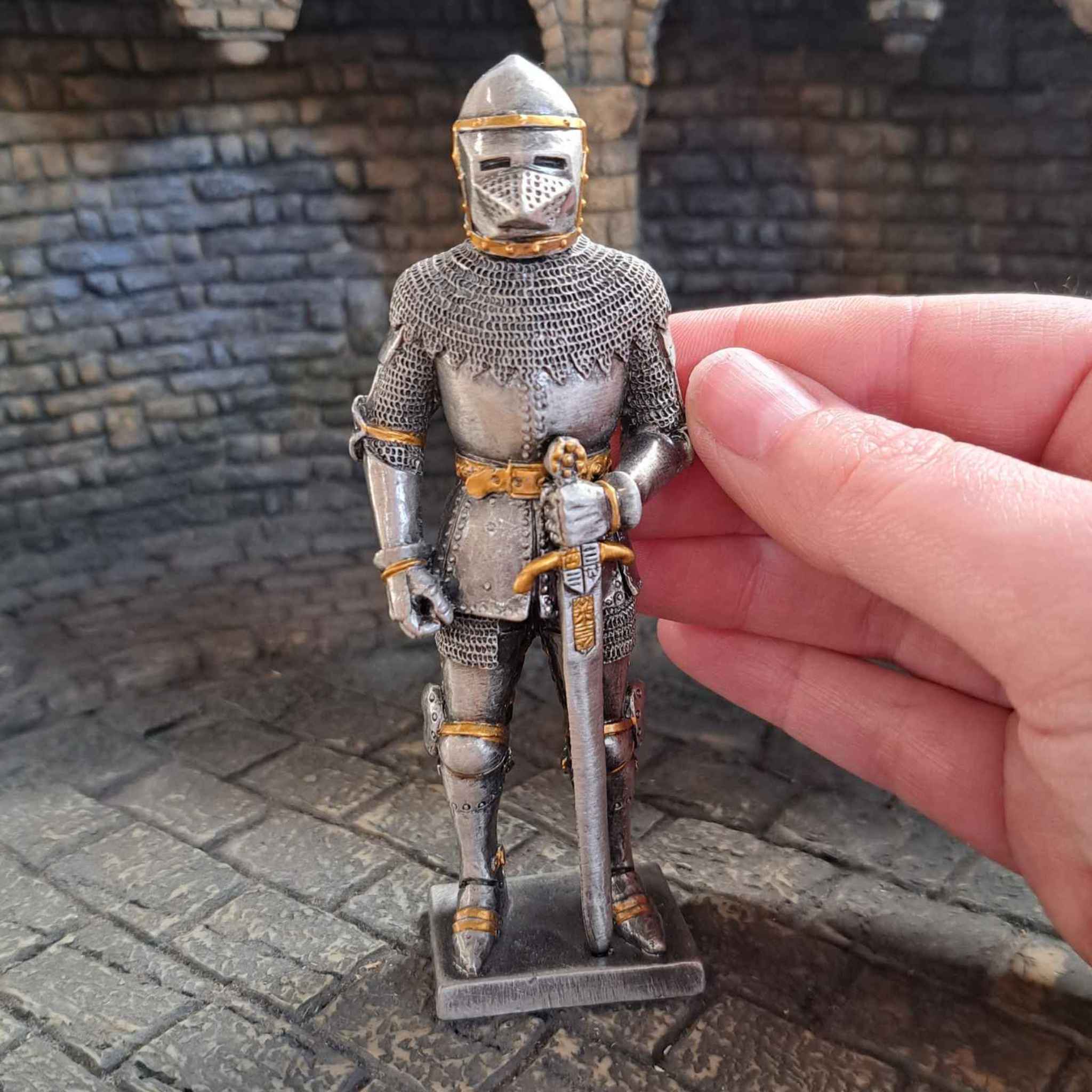 bascinet knight sculpture with hand pictured for scale