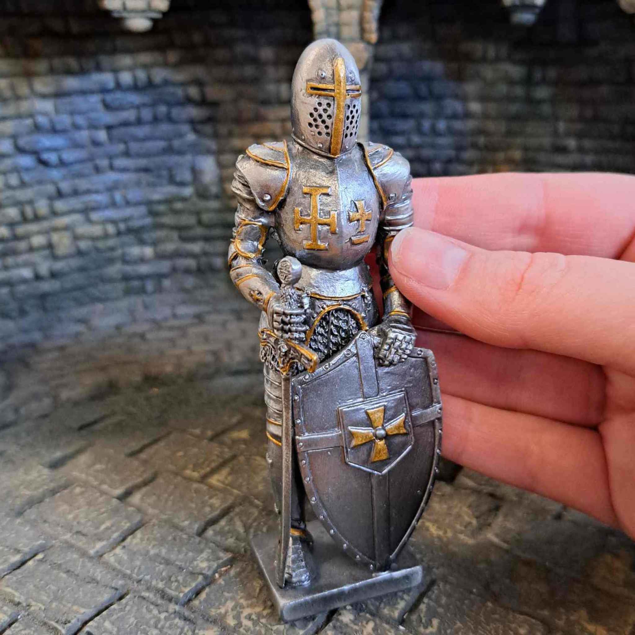 Knight with Sword Metal Statue with hand pictured for scale