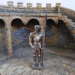 Jousting knight statue with medieval background