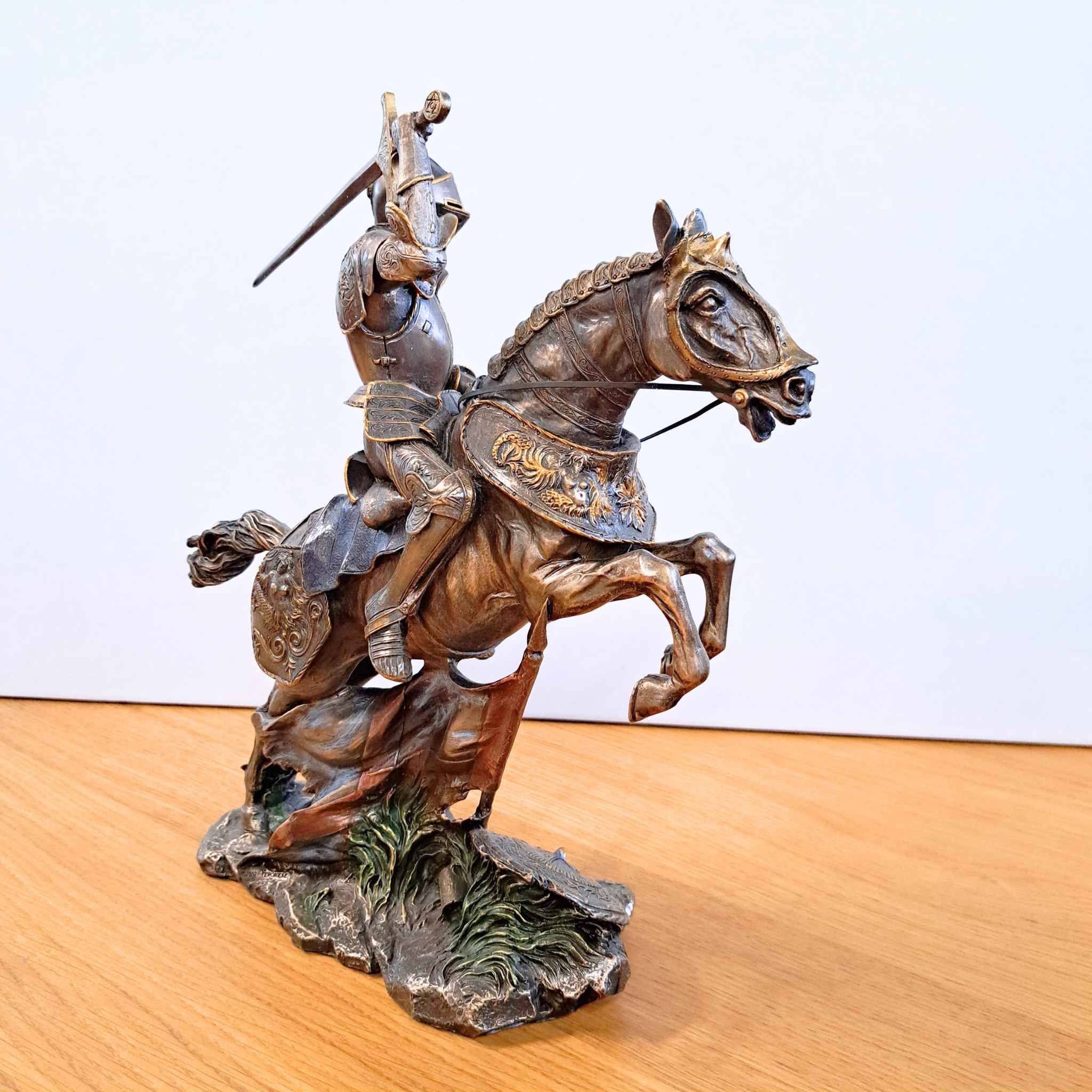 Large mounted knight with sword resin statue side view