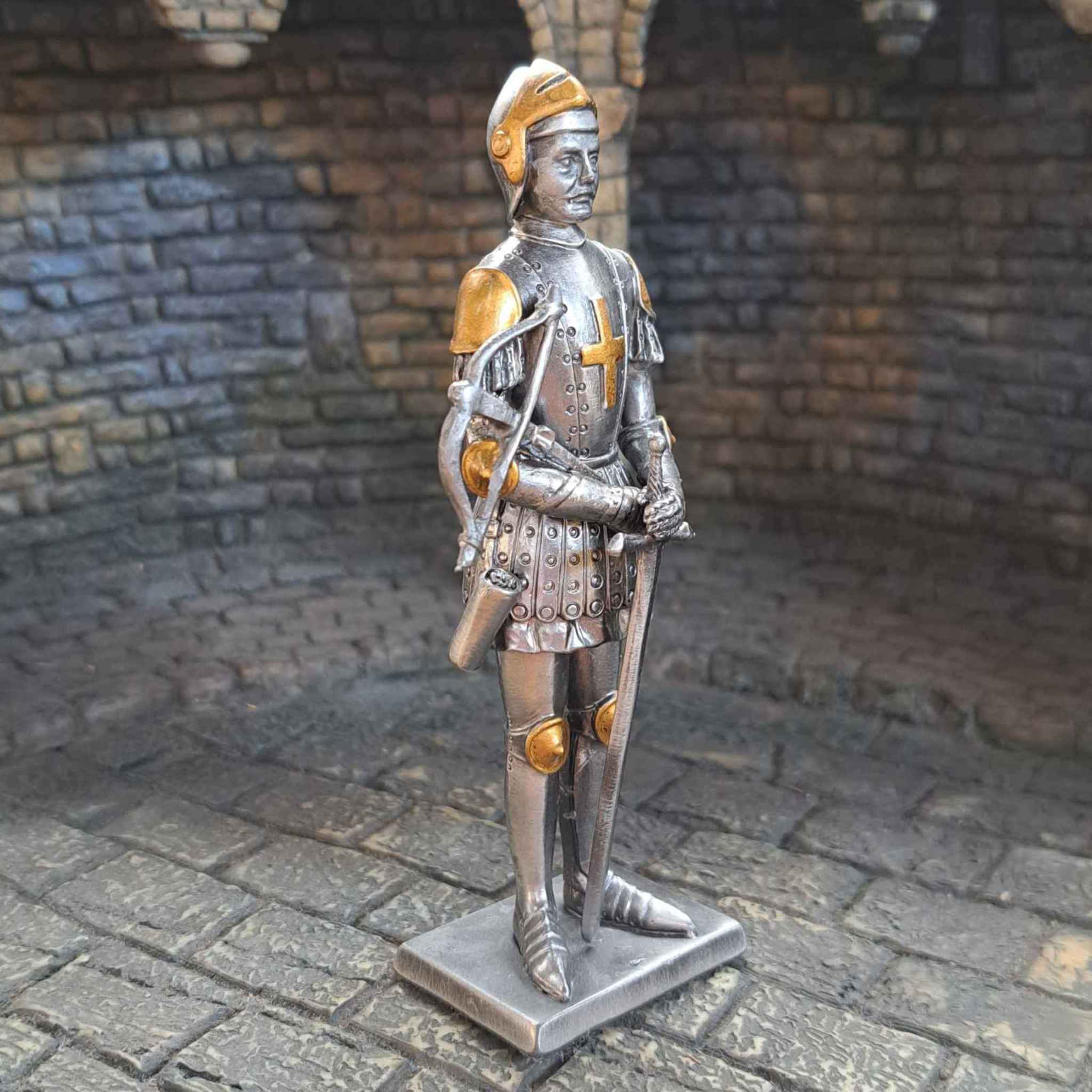 Knight with crossbow metal statue side view